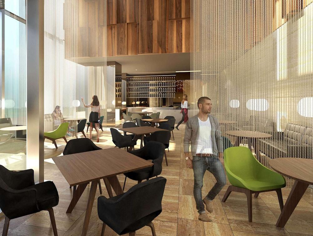 Aleph Doha Residences, Curio Collection By Hilton Zewnętrze zdjęcie The interior of the new restaurant