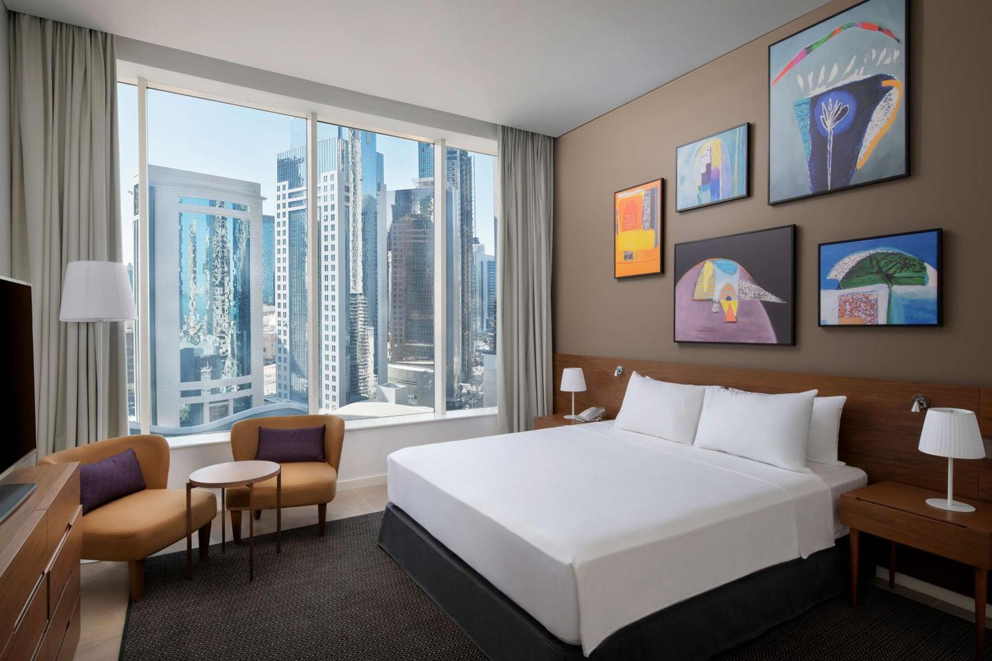 Aleph Doha Residences, Curio Collection By Hilton Zewnętrze zdjęcie A guest room at the hotel