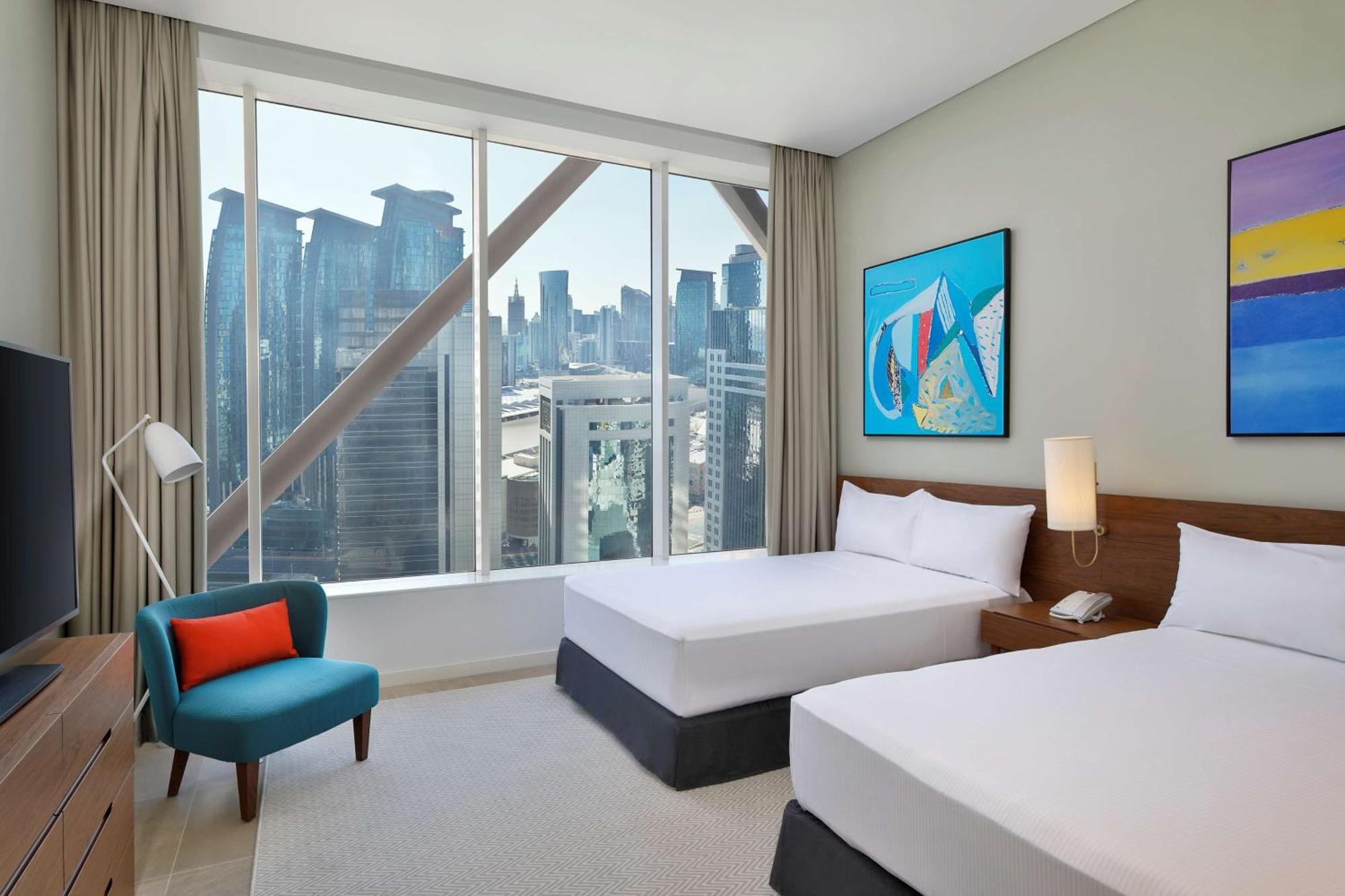 Aleph Doha Residences, Curio Collection By Hilton Zewnętrze zdjęcie A guest room at the hotel