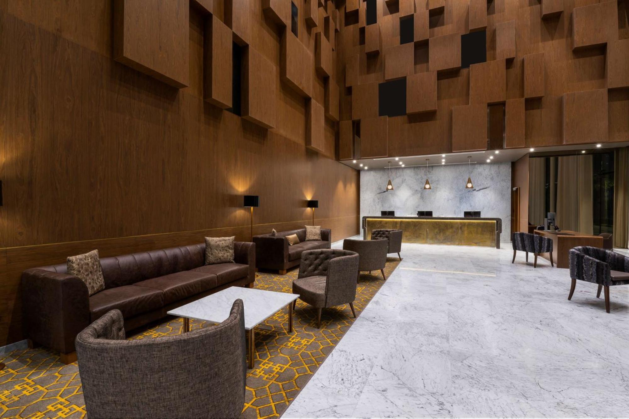 Aleph Doha Residences, Curio Collection By Hilton Zewnętrze zdjęcie The lobby of the hotel