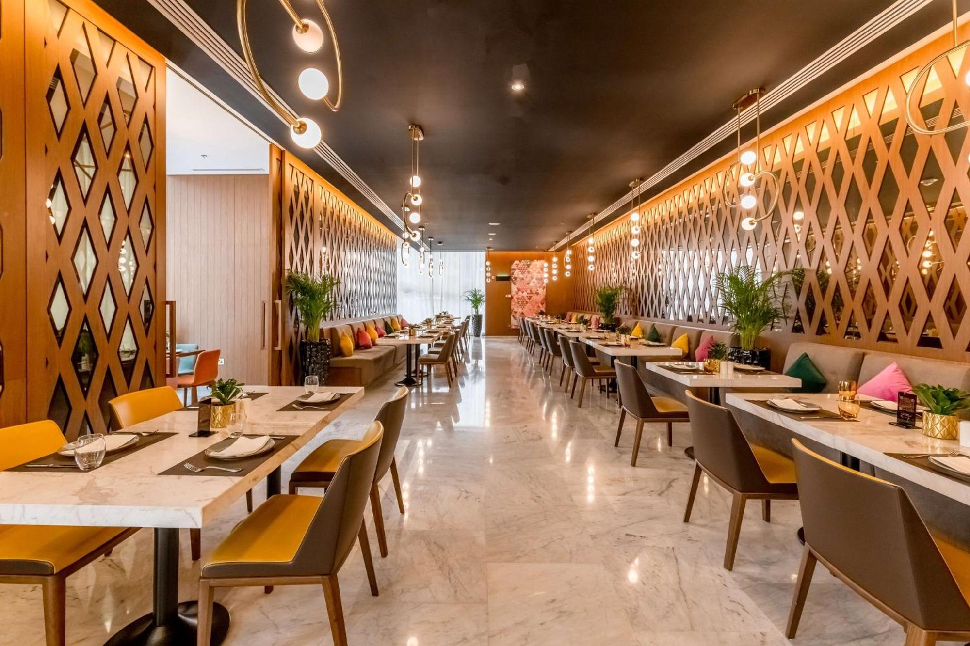 Aleph Doha Residences, Curio Collection By Hilton Zewnętrze zdjęcie The interior of the restaurant