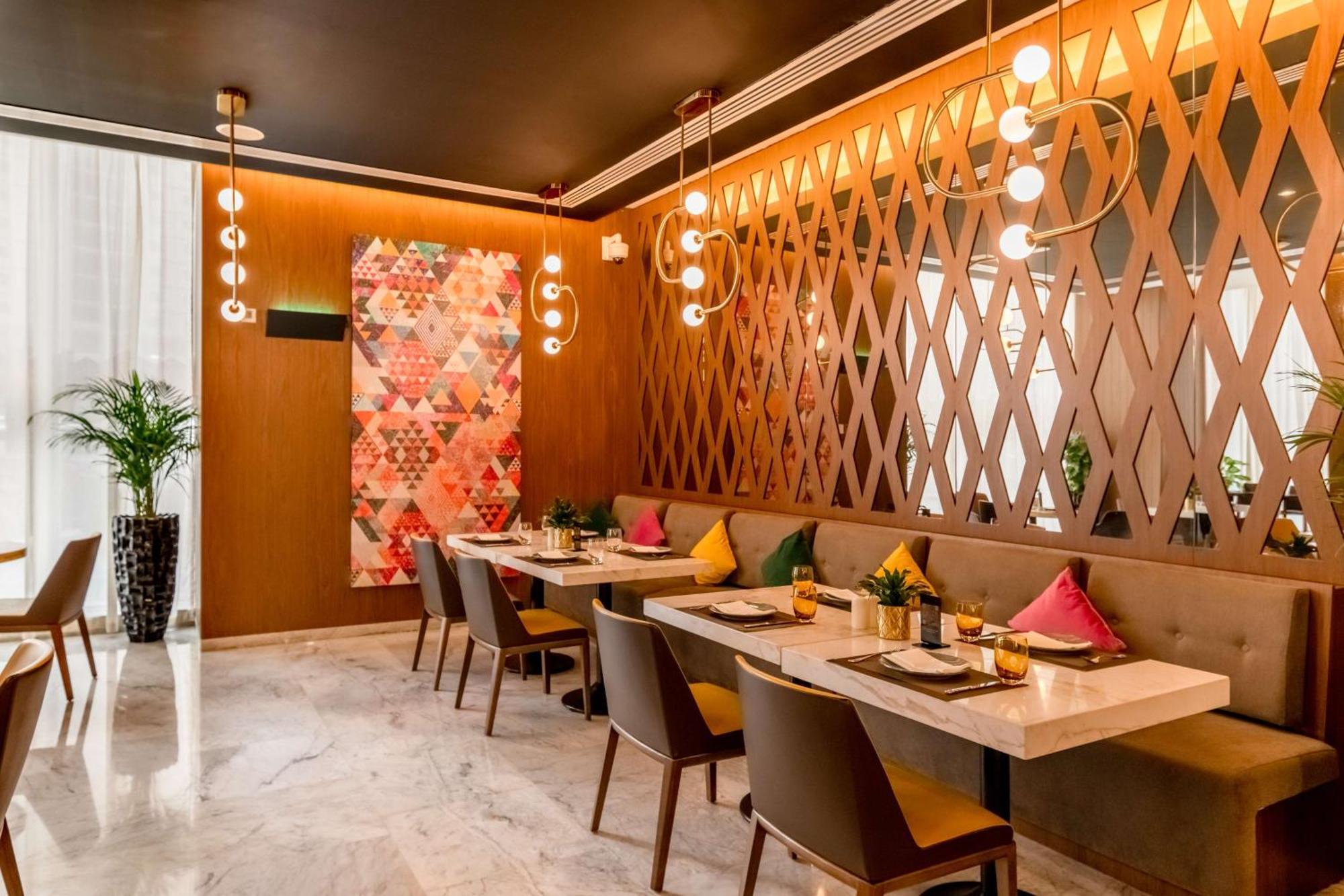 Aleph Doha Residences, Curio Collection By Hilton Zewnętrze zdjęcie The interior of the restaurant